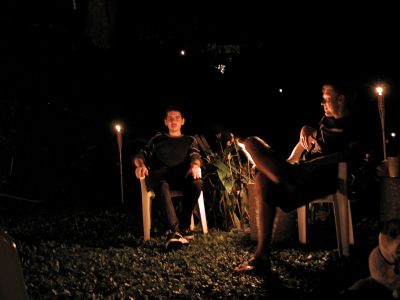 Me and will powell at a bonfire in the neighbors joe and luana's back yard.  and will turned his head during the pic...