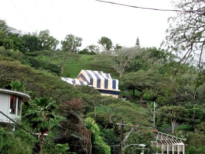 The house tented for termites as seen from Kam Highway