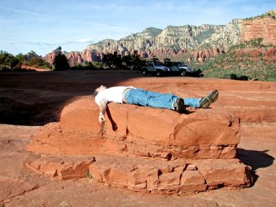 came across another silver jeep on the trip.  me laying on a rock near chicken point… the banage on my hand was because a jar exploded into pieces when I was picking it up, and it sliced me up.