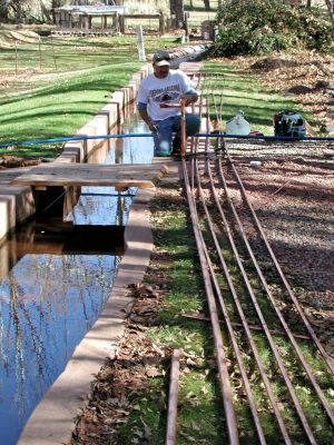 the pipes for the Geothermal system finally being put in the irrigation ditch