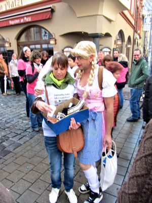 these are teams going into hofbrau house to drink, sport, drinking beer