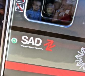 i like this pic of the sad looking kids on the sad train